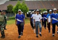 Sambut HUT Ke-80 RI, Satgas Yonif 144/JY Latih Paskibra Siswa SMA